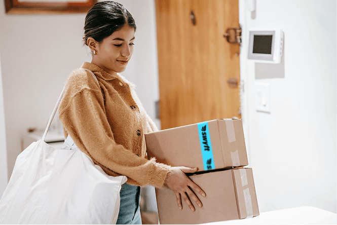 Woman receiving packages with Swyft delivery